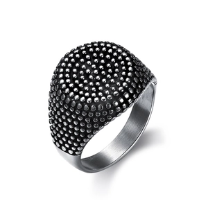 Close-up of Viking compass cross ring showing silver and black embossed textures