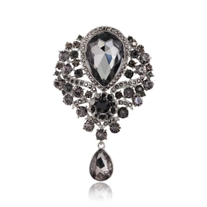 Vintage style grey crystal rhinestone brooch with teardrop glass pendant in silver finish