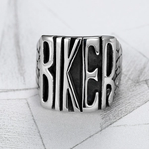 Punk style stainless steel biker ring with bold BIKER engraving and textured finish