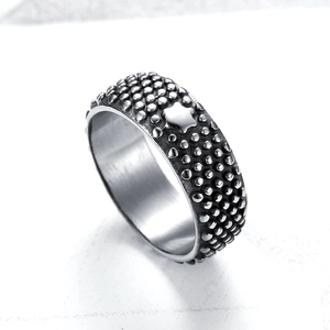 Retro stainless steel ring with textured dot pattern and star emblem, silver finish