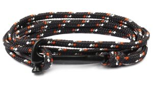 Close-up of woven tricolor rope bracelet with unique black hammerhead shark anchor clasp