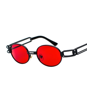 Steampunk oval sunglasses with red lenses and black metal frame on white background