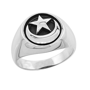 Detailed close-up of a silver men's ring featuring a moon and star relief on polished steel