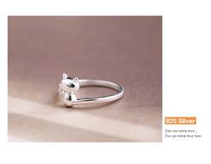 Macro view of cute 925 silver cat-shaped open ring with smooth polished metallic finish