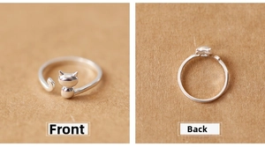 Detailed front and back view of a minimalist silver cat-shaped adjustable open ring