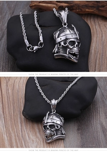Macro view of vintage titanium steel skull helmet pendant with detailed punk engraving