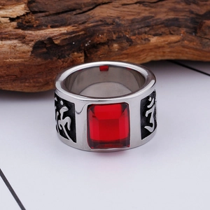 Men's titanium steel ring with red rectangular gemstone and engraved Sanskrit symbols