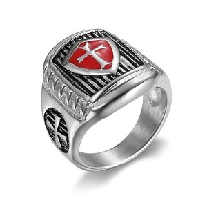 Vintage stainless steel signet ring featuring red enamel shield and silver knight cross