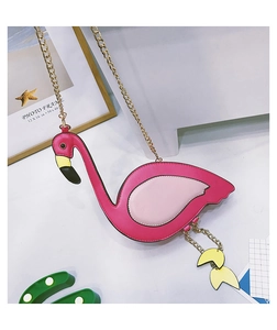 Detailed side view of flamingo shaped crossbody bag with gold chain strap and pink PU leather