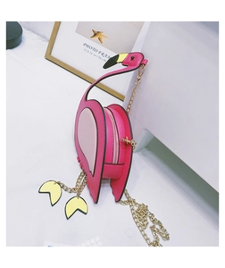 Detailed view of pink flamingo crossbody bag with golden chain strap and PU leather design