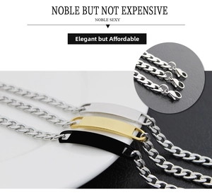 Detailed close-up of polished silver, gold, and black stainless steel engraving bracelets