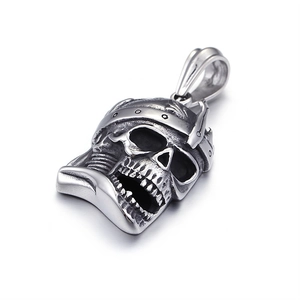 Gothic silver stainless steel skull pendant with crown detail on white background