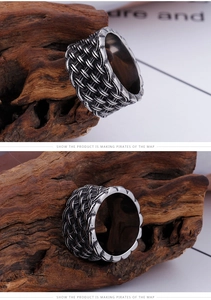 Macro detail of men's vintage woven titanium steel ring with oxidized silver finish