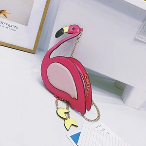 Detail of creative flamingo crossbody bag featuring pink PU leather and golden chain strap