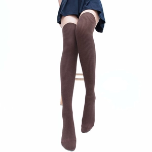 Brown knit thigh-high yoga socks with ribbed texture for women in over-the-knee style