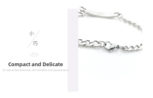 Detailed macro view of polished stainless steel Cuban chain link with a blank engravable ID tag
