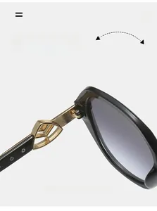 Detail of durable gold metal hinge on oval sunglasses with stylish cutout temple design