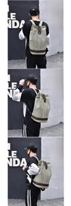 Detail of olive canvas drawstring backpack with brown leather reinforced accents
