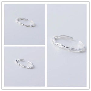 Detailed macro view of S925 sterling silver woven and hollow geometric open rings