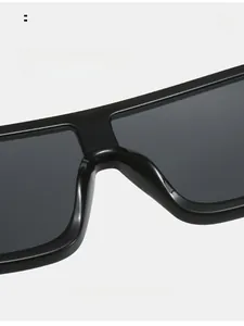 Close-up of comfortable integrated nose pads on oversized black square sunglasses