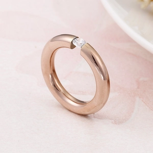 Elegant rose gold titanium steel ring with a round zircon inlay in a tension setting