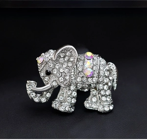 Detail of silver elephant brooch with sparkling white and colorful AB rhinestones
