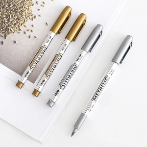 Metallic craftwork pens in gold and silver colors for signing and greeting cards