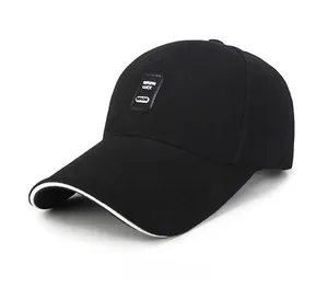 Detail view of cotton baseball cap with custom patch and contrast piping on the brim