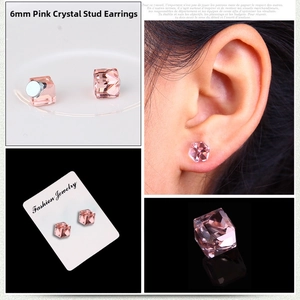 Detail of 6mm pink crystal magnetic stud earrings shown on packaging and model