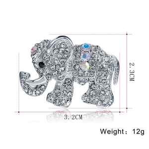 Sparkling elephant brooch in silver alloy with white rhinestones and dimensions shown