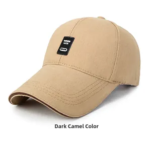 Close-up of a dark camel cotton baseball cap featuring a black rectangular patch