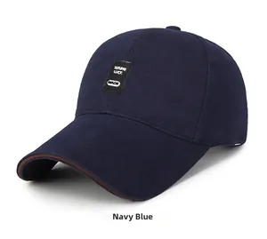 Detail of navy blue cotton baseball cap featuring TUTUPAI LUCK patch and curved brim