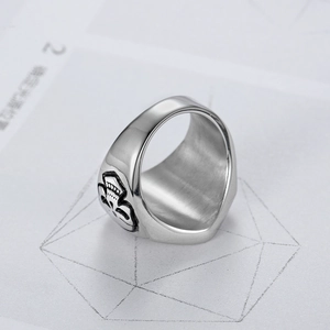 Vintage stainless steel skull motorcycle ring with high polish and side relief detail