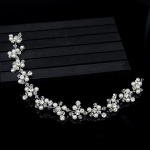 Handmade bridal hair vine with white pearls and crystals on silver wire for wedding hair