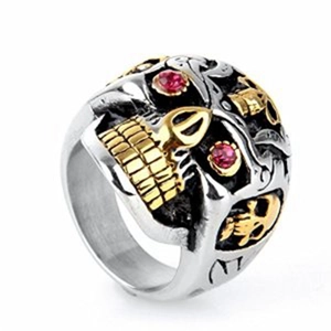 Gothic skull ring for men with red ruby eyes and two-tone silver and gold plating