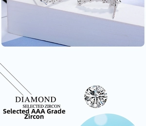 Close-up of silver star earrings featuring high-quality AAA cubic zirconia inlay details