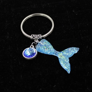 Exquisite ocean mermaid keychain featuring blue gradient fish tail and glitter fish scale charm