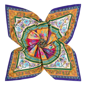 Detail of baroque floral pattern on silk-satin scarf with vibrant purple and orange motifs