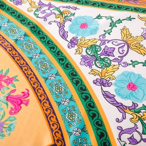 Close-up of baroque floral patterns on luxury 130cm silk-like satin square scarf