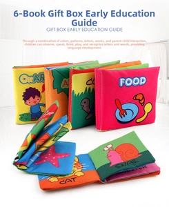 Detail view of 6-pack baby cloth books with colorful animal and food patterns in a gift box