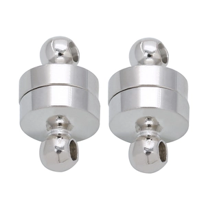 Macro detail of polished chrome magnetic jewelry clasps for DIY necklace making