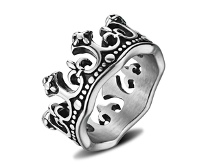Detail of vintage crown ring showing gothic fleur-de-lis patterns in antique steel finish