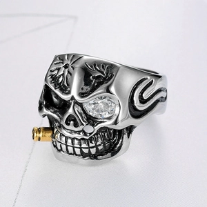 Classic men's punk skull ring with golden pipe and zircon eye in vintage finish