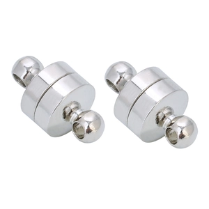 Macro detail of polished silver magnetic jewelry clasps for DIY necklace and bracelets