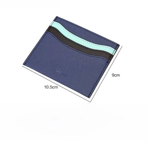 Deep blue slim card holder with 6 card slots and center compartment in cross-grain PVC