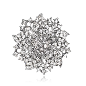 Luxurious crystal flower brooch with silver metal frame and sparkling rhinestones