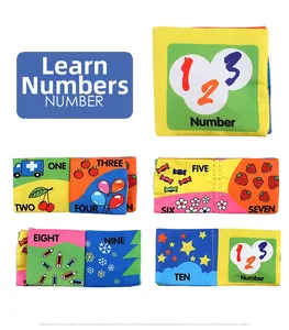Detail of soft fabric baby book pages showing colorful numbers from 1 to 10 for learning
