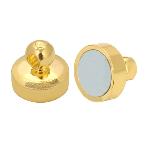 Macro shot of gold magnetic jewelry clasps with ring loops on a white background