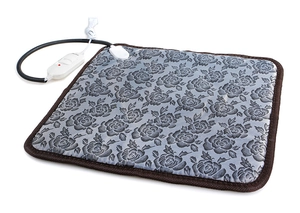 Détail du tapis chauffant pour animaux avec motif floral et contrôleur réglable