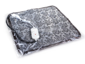 Vue détaillée du tapis chauffant gris pour animaux avec motif de roses et commande